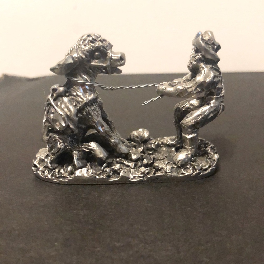Vint, miniature, pewter figurine of a man pulling a Donkey